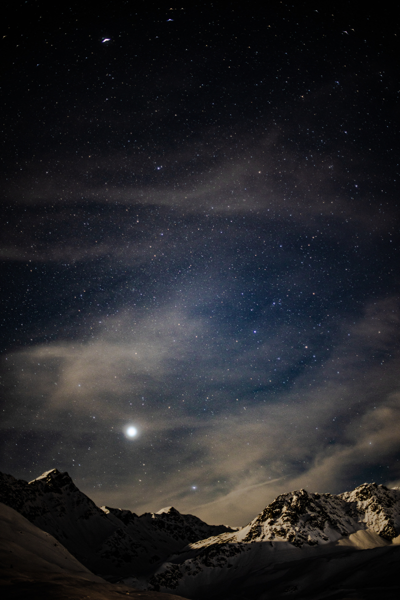 <p>Sirius - the brightest star in our solar system shines above the Swiss Alps. The clear starry sky allows the beautiful scene of light and shadow on the mountain peaks. Arosa, Switzerland.</p>